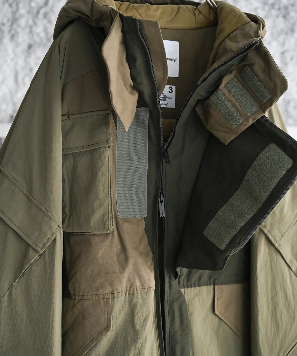 WM×NEXUSⅦ ASYMMETRY JACKET  - White Mountaineering®︎