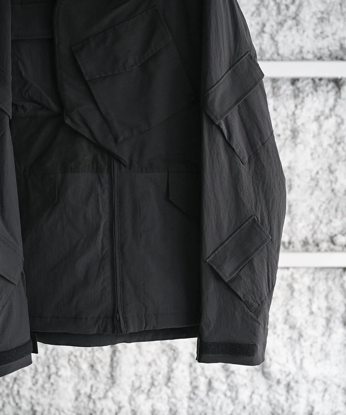 WM×NEXUSⅦ ASYMMETRY JACKET  - White Mountaineering®︎